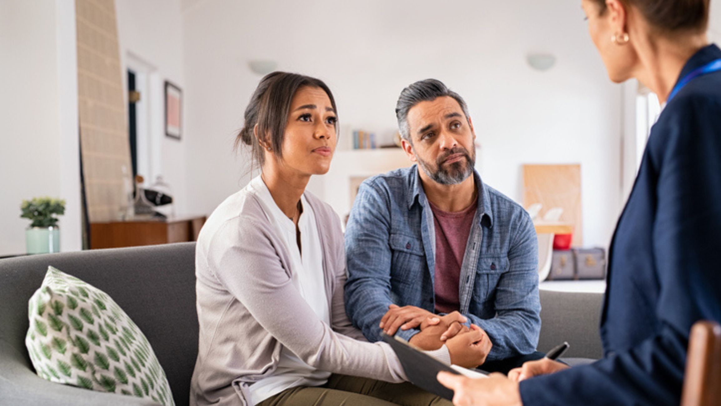 Couple talking about backing out of a deal