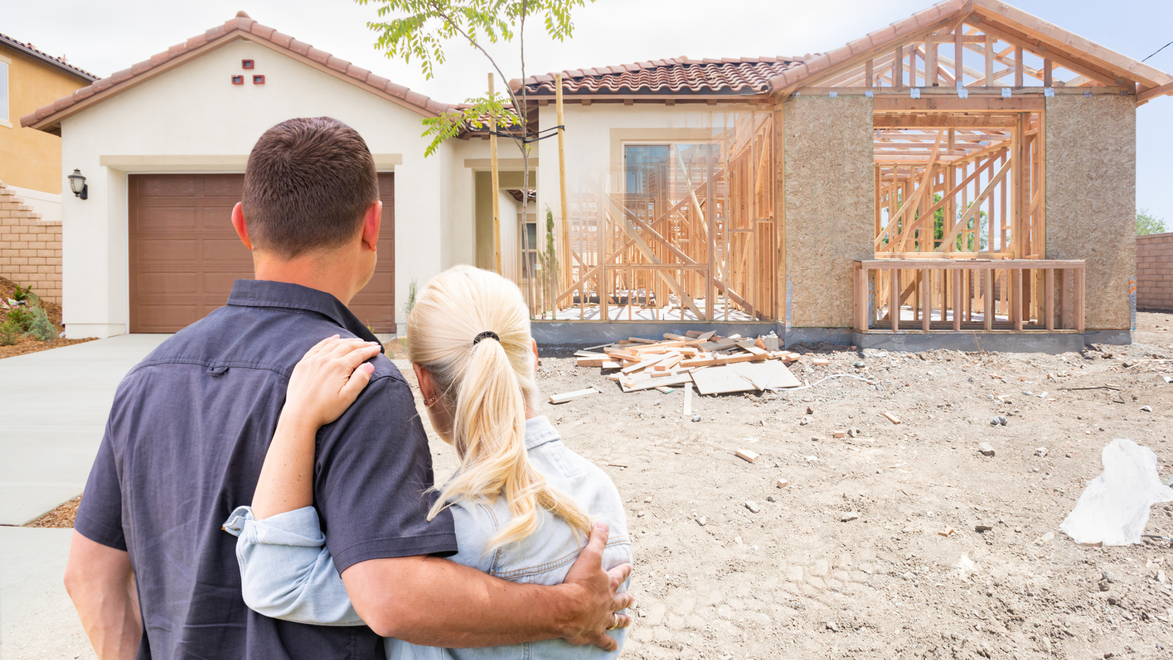 Couple viewing new construction home